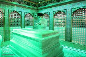 Ayatollah Khamenei Dusts Holy Tomb of Imam Reza (+Photo & Video)